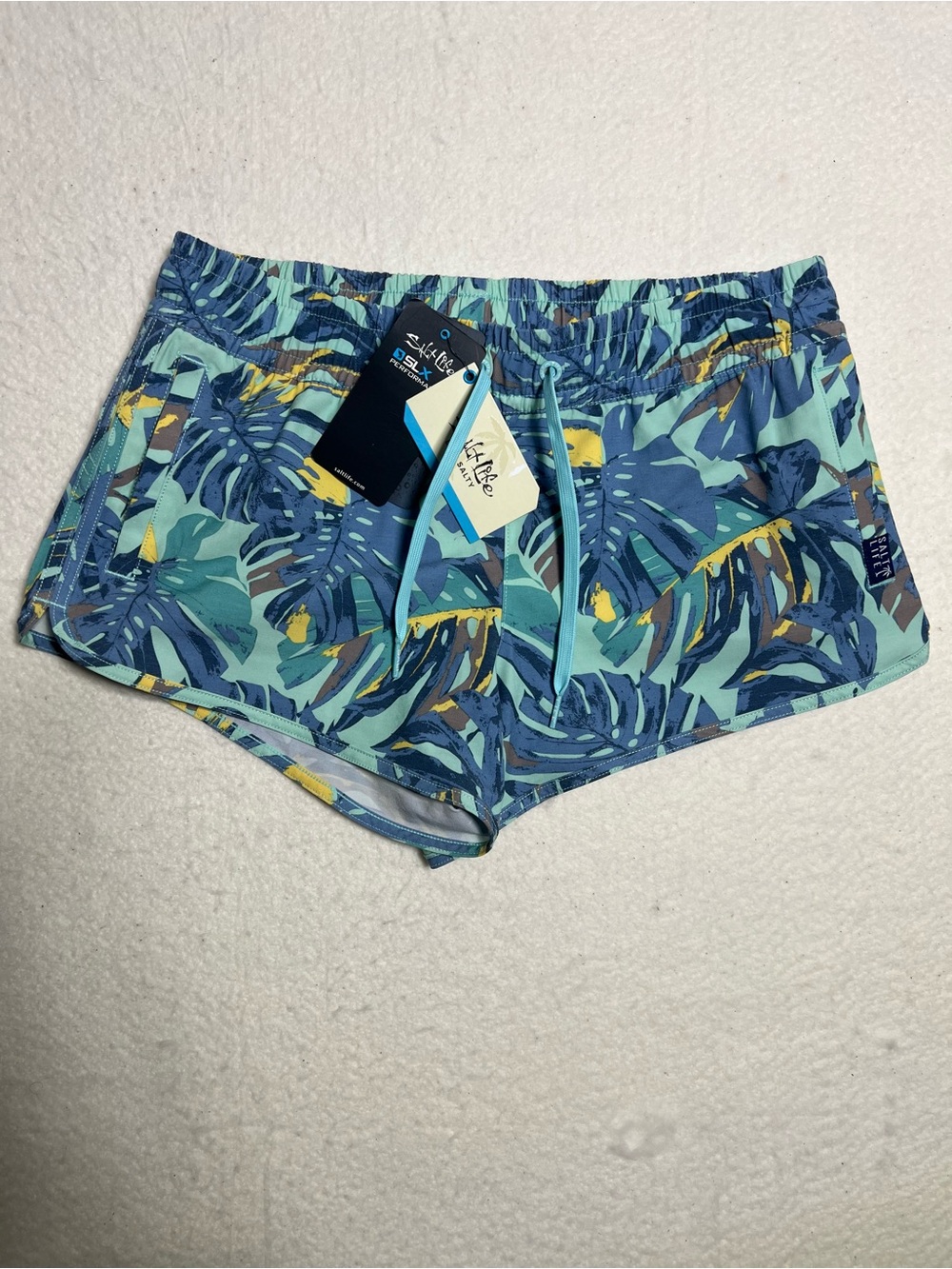 Salt Life Women’s Blue Tropical Leaf Athletic Shorts